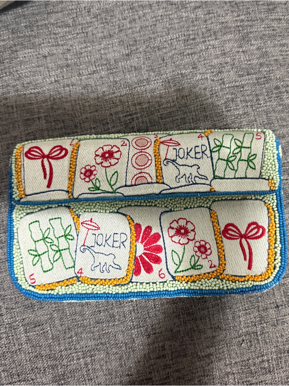 Anthropologie Embroidered Playful Game Tile Clutch in Cream, Red, Green, Blue